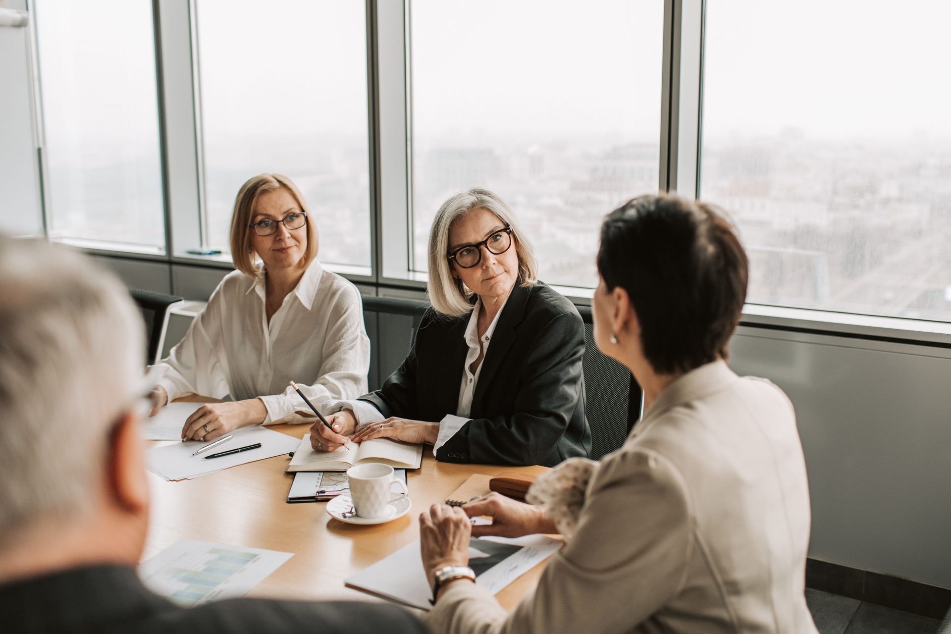 Greensearch consultants and a candidate in a meeting, feedback conversation